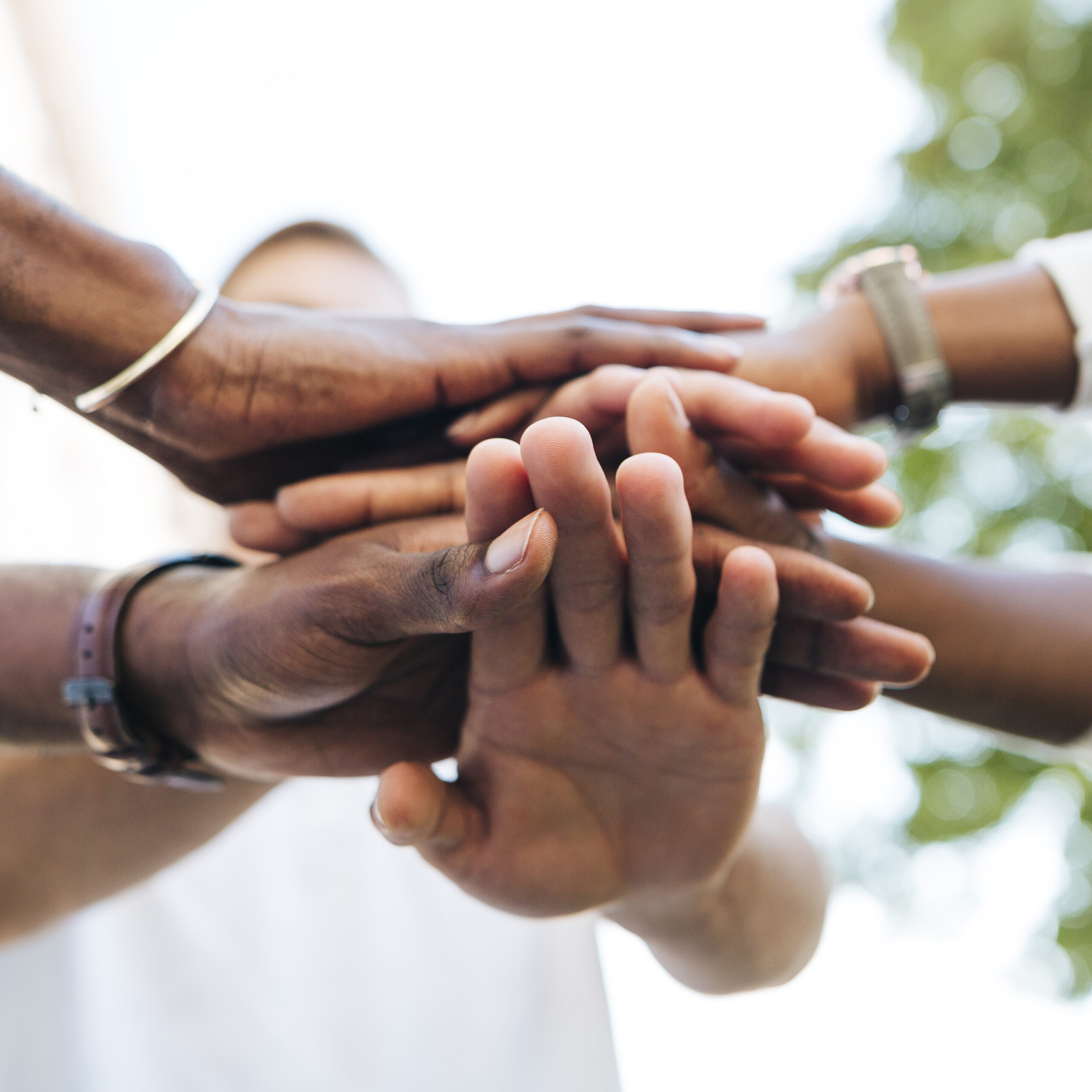 intercultural-hand-shake-outdoor